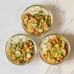 Thai Green Curry with Jasmine Rice in meal prep containers
