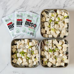 Customised Instant Tofu Miso Soup with tofy and rice noodles in a meal prep container
