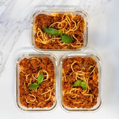 Meal prep container with Spaghetti Bolognese with soya mince