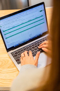 Lien working on her Meal Prep Menu on the computer