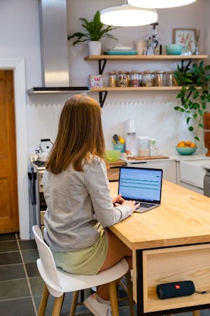 A home chef making a meal plan for the week ahead.