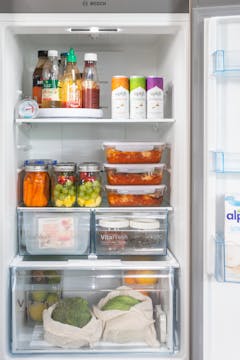 A fridge stocked with prepared meals.